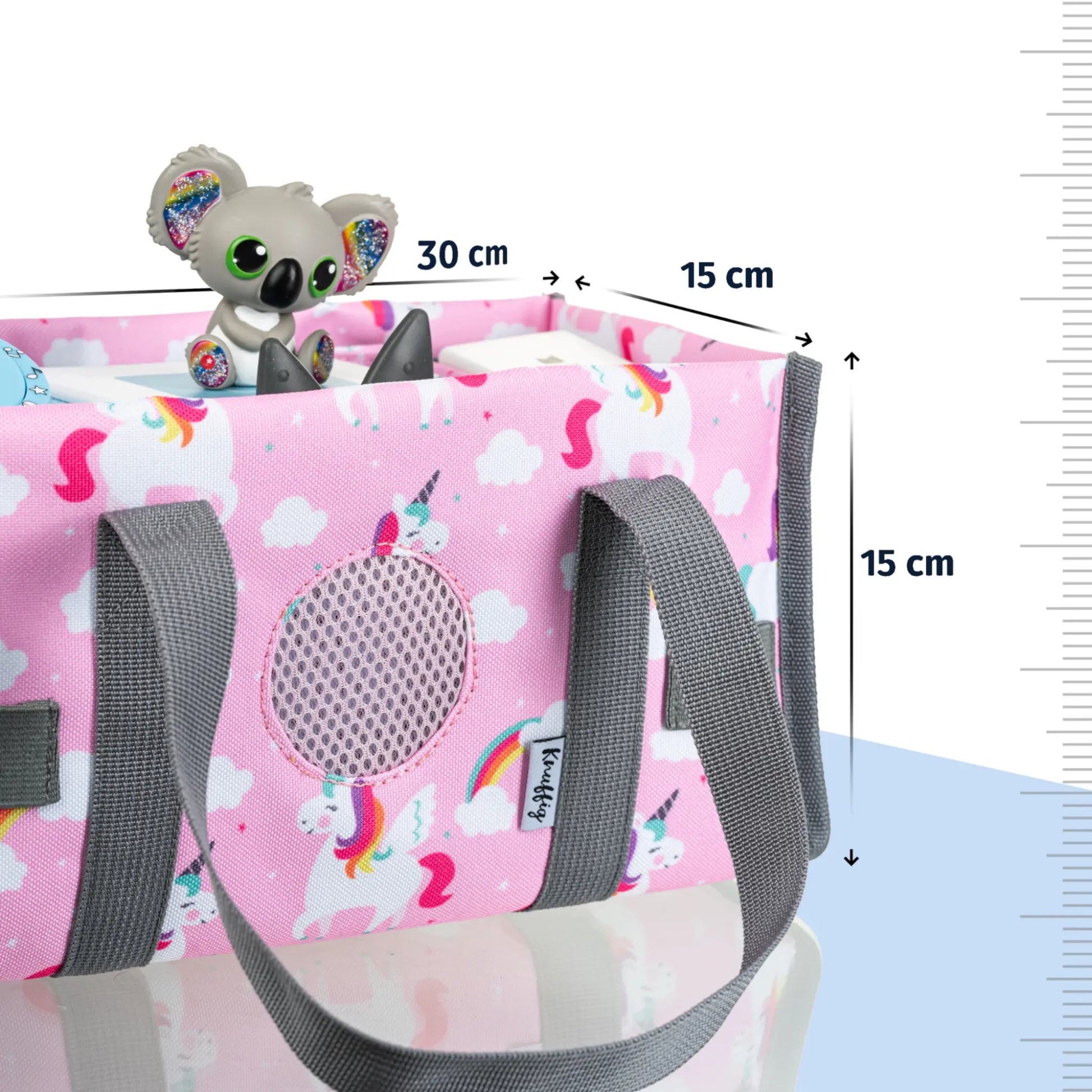 Darstellung der Abmessungen der rosa Einhorn-Tragetasche; zeigt die kompakte Größe, die perfekt auf die Toniebox zugeschnitten ist, um einen sicheren und passgenauen Transport zu garantieren.